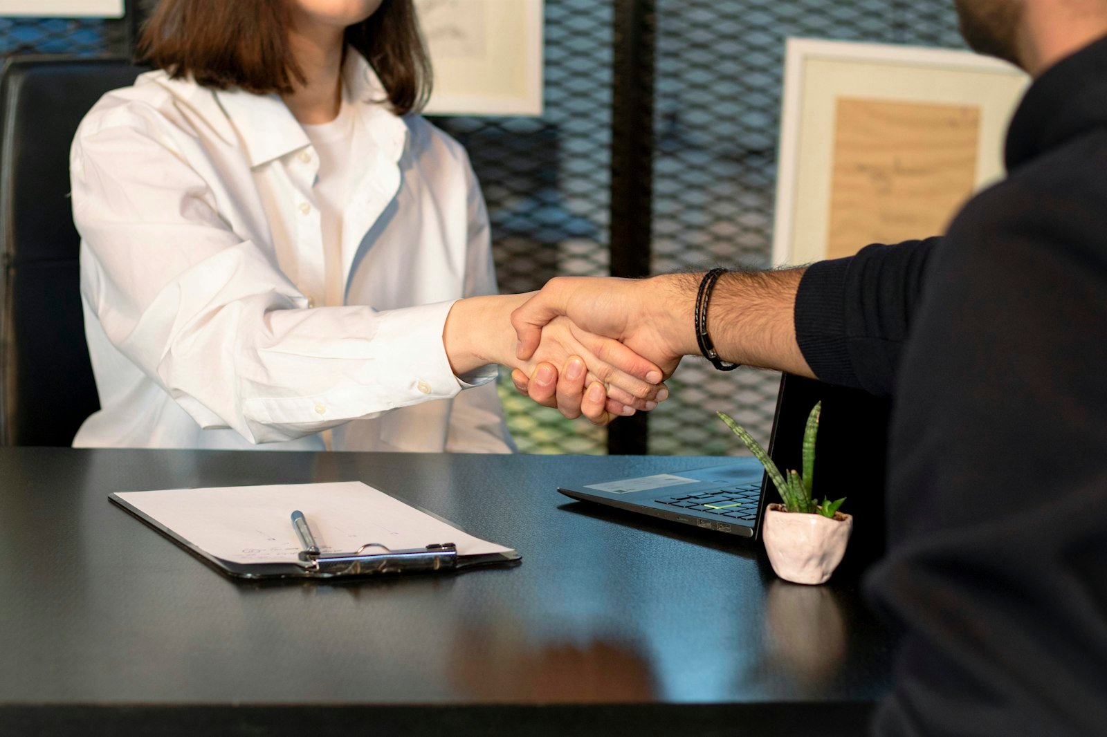 Business partners shaking hands
