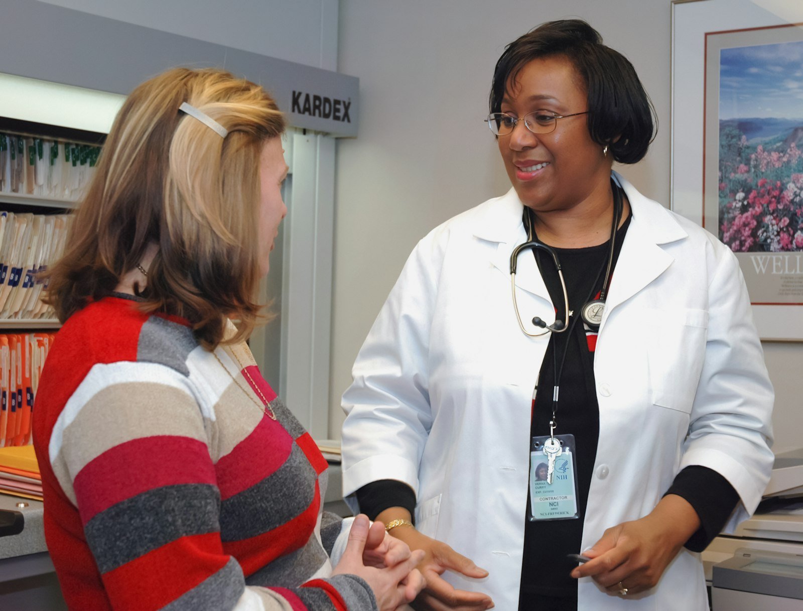Doctor speaking with a patient in a clinic