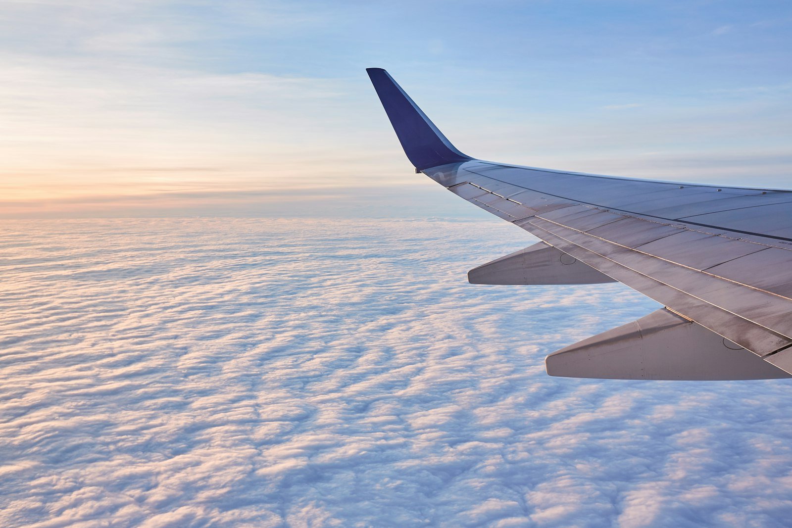 Aeroplane wing above the clouds
